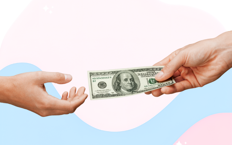 One hand giving money to another on an abstract pink and blue swirled background