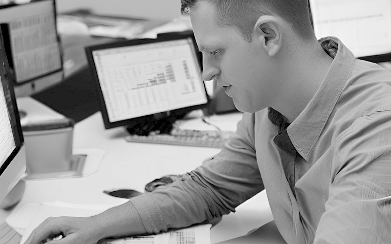 Male volunteer working at his desk