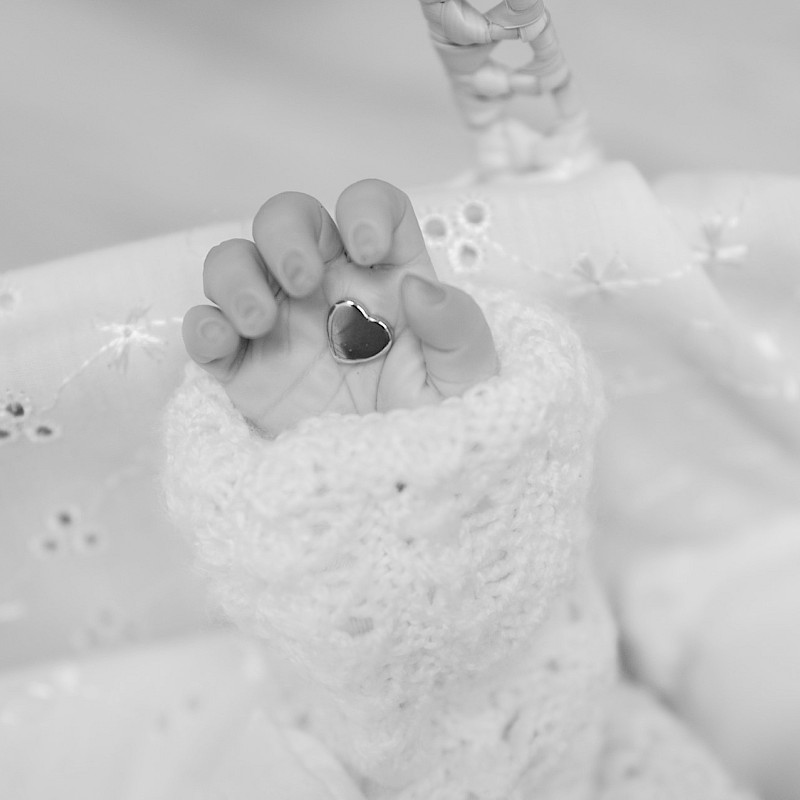 Close up of Jasmine Rose's hand holding a tiny heart