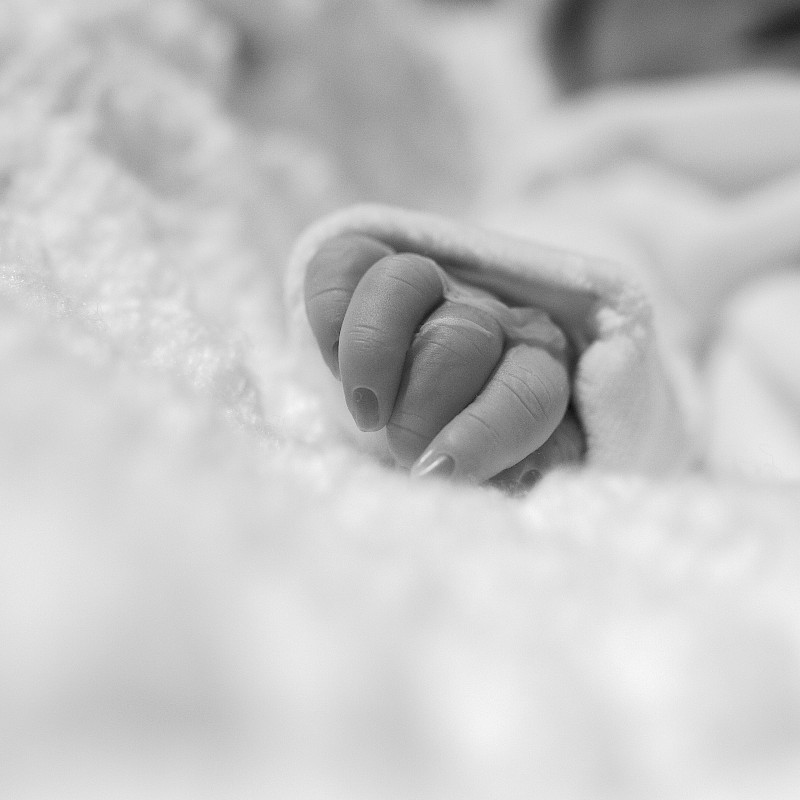 Baby Henry's hand, in focus and close up to the camera